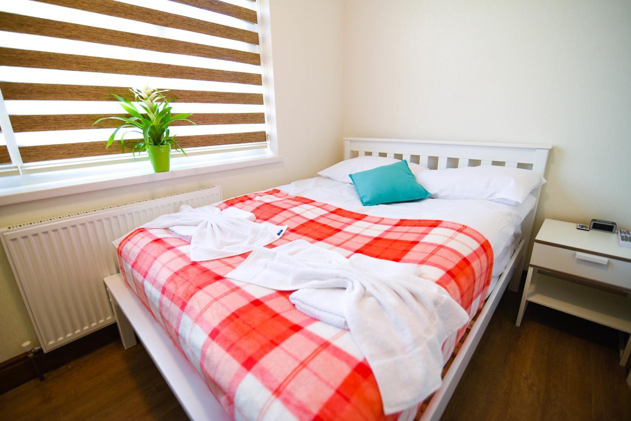Green Suites Londres Quarto foto